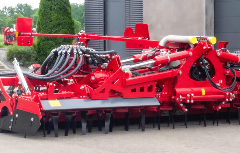 Herse rotative et outil à dents